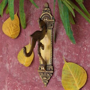 Peacock brass door handle